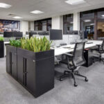 office planter boxes with tambour storage in a bright modern workspace